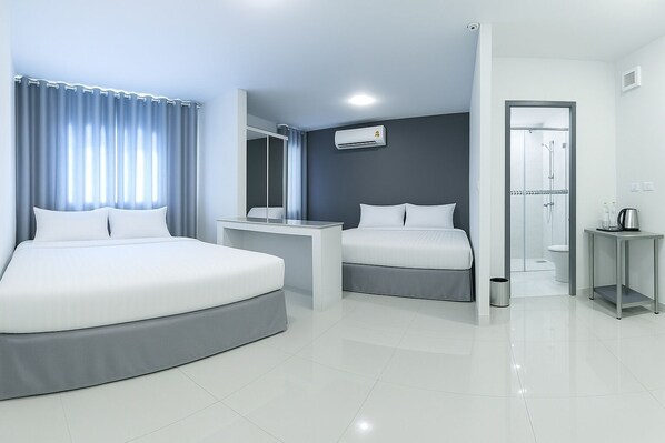 Family Room, Balcony | 1 bedroom, blackout drapes, soundproofing, free WiFi