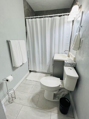 Shower, towels, soap, shampoo