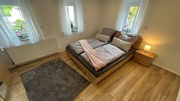 2 bedrooms, travel crib, WiFi, bed sheets