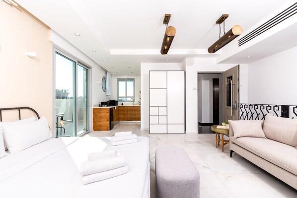 Exclusive Studio Suite, Balcony | Living area | 42-inch flat-screen TV with digital channels, Netflix - KEDEM - By Beach Apartments TLV (Tel Aviv)