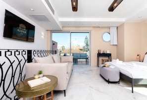 Exclusive Studio Suite, Balcony | Living area | 42-inch flat-screen TV with digital channels, Netflix - KEDEM - By Beach Apartments TLV (Tel Aviv)