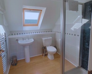 Dutxa, assecador de cabells i tovalloles 