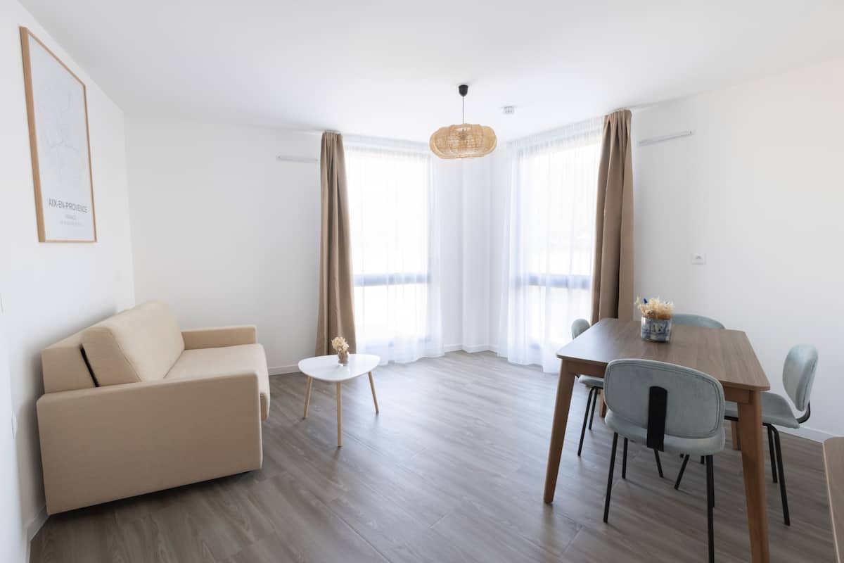 Classic Apartment | Living area | 108-cm flat-screen TV with digital channels, Netflix, streaming services