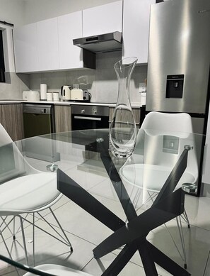 Classic Apartment | Private kitchen | Full-size fridge, toaster
