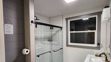 Hair dryer, towels, soap, shampoo