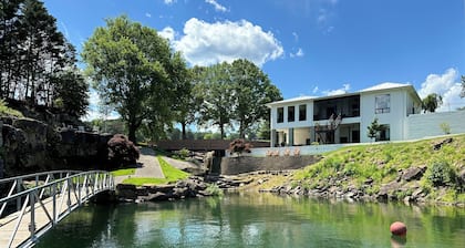 Unique home on the waters edge with no stairs to lake & pontoon rental option