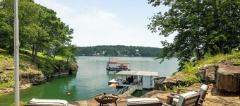 Unique home on the waters edge with no stairs to lake & pontoon rental option