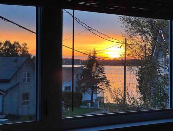 Enjoy a serene view of the water and surrounding homes from this urban retreat.