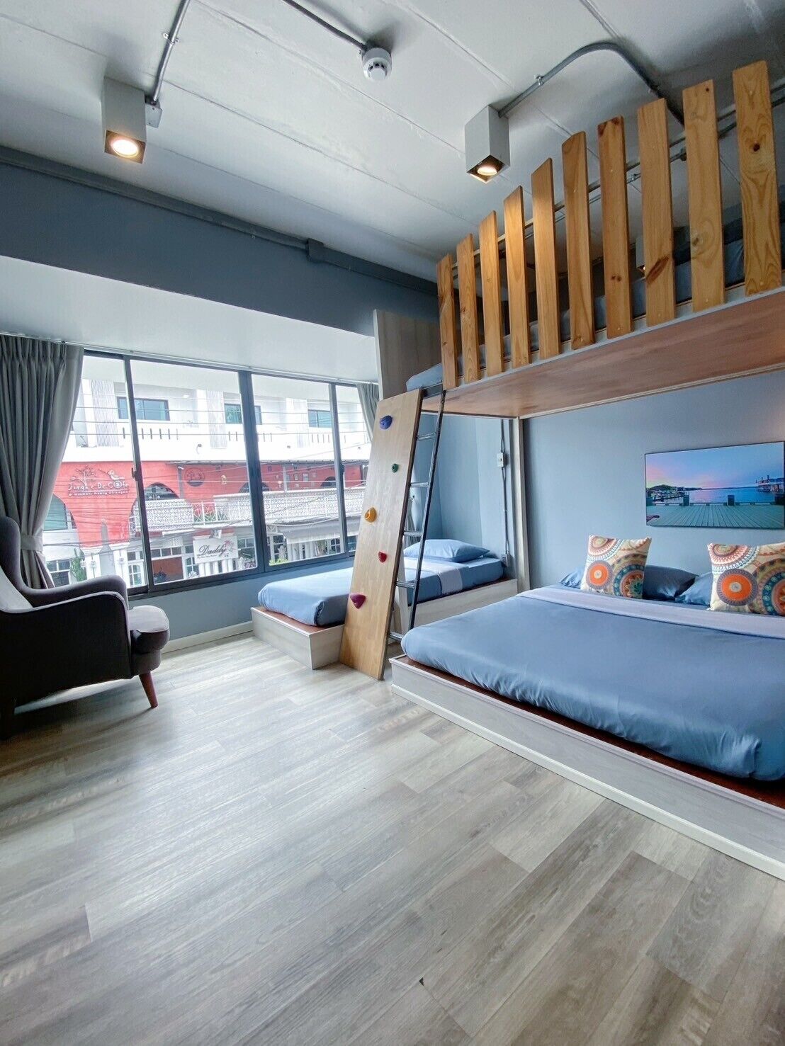 Deluxe Family Room | In-room safe, individually decorated, desk, laptop workspace