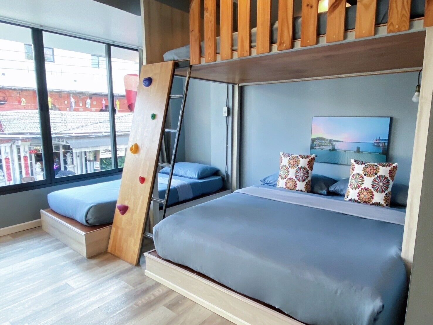 Deluxe Family Room | In-room safe, individually decorated, desk, laptop workspace