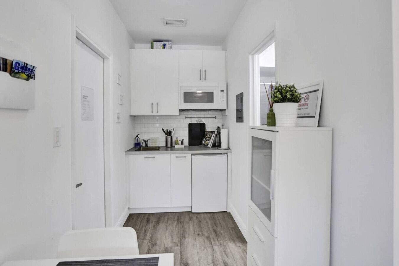 Microwave, coffee/tea maker, toaster, cookware/dishes/utensils