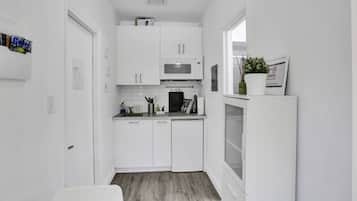 Microwave, coffee/tea maker, toaster, cookware/dishes/utensils