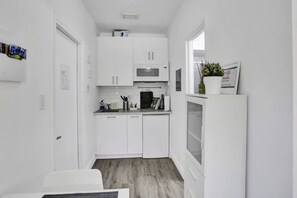 Microwave, coffee/tea maker, toaster, cookware/dishes/utensils