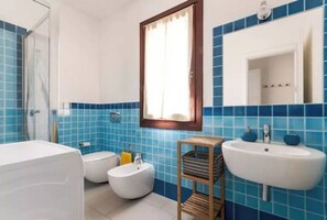 Hair dryer, towels, soap, toilet paper