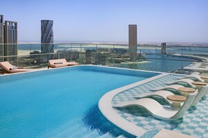Outdoor pool, open 6:00 AM to 5:30 PM, sun loungers, lifeguards on site