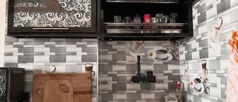 Fridge, microwave, stovetop, coffee/tea maker