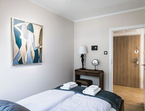 1 slaapkamer, een strijkplank/strijkijzer, wifi, beddengoed