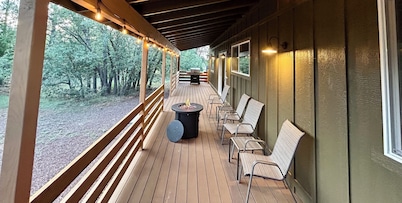 Enjoy a relaxing stay in this mountain home with open layout and spacious deck.