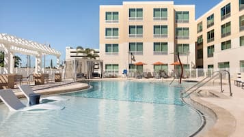 Outdoor pool, open 7:00 AM to 10:00 PM, free pool cabanas