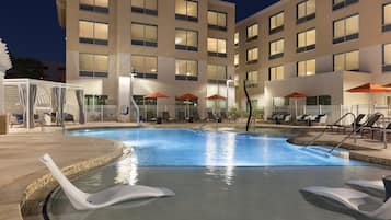 Outdoor pool, open 7:00 AM to 10:00 PM, free pool cabanas