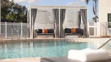 Outdoor pool, open 8:00 AM to 10:00 PM, free cabanas, pool umbrellas