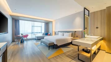 Premium bedding, down comforters, desk, laptop workspace