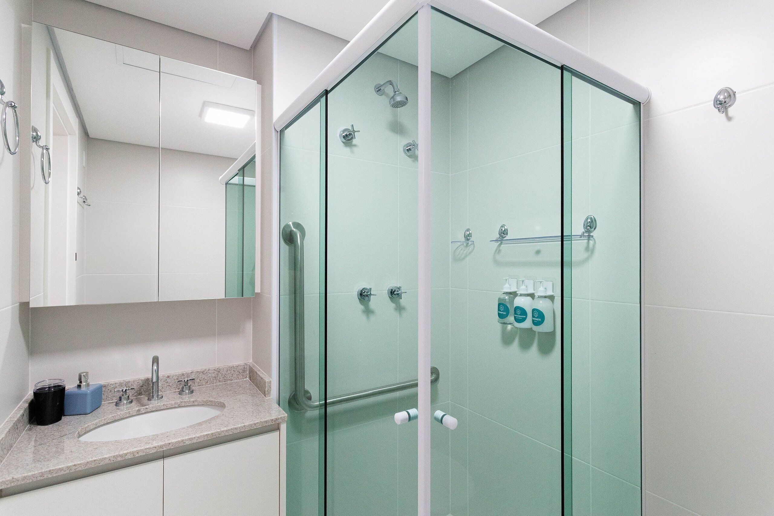 City Studio | Bathroom | Shower, rainfall showerhead, hair dryer, towels