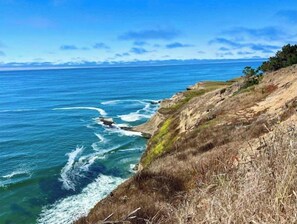 On the beach, sun-loungers, beach towels