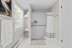 Shower, hair dryer, bidet, towels
