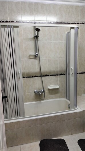 Hair dryer, towels, soap, toilet paper