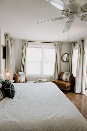 1 bedroom, desk, iron/ironing board, travel crib