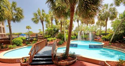 Beachfront condo with beach access, 4 pools, 4 hot tubs, sauna, W/D