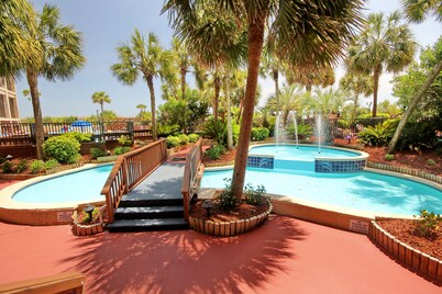 Beachfront condo with beach access, 4 pools, 4 hot tubs, sauna, W/D