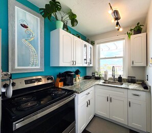 Fridge, microwave, oven, stovetop - Charming suite w/ private deck Downtown FMB (Fort Myers Beach)