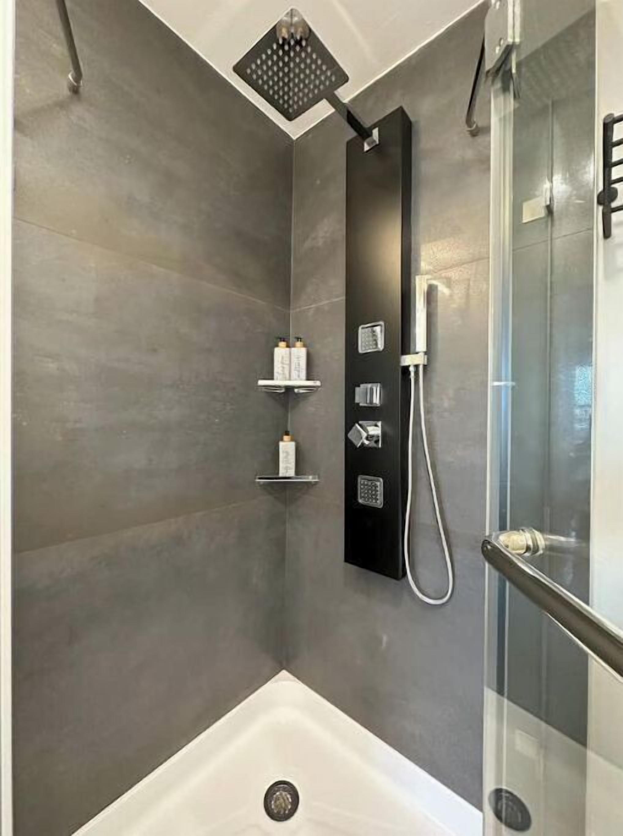 Shower, hair dryer, towels, soap