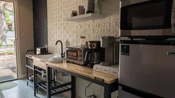 Microwave, coffee/tea maker, cookware/dishes/utensils