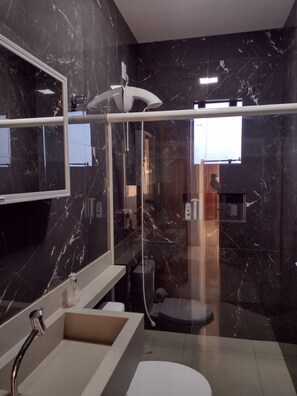 Shower, hair dryer, towels, soap