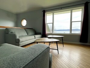 Holiday Home Ocean View | Living area | 32-inch LED TV with satellite channels - Sea Breeze Cottages And Motel (Ingonish)