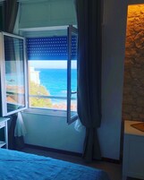 Deluxe Double or Twin Room, 1 Bedroom, Sea View, Beachside | Premium bedding, free minibar, in-room safe, individually decorated