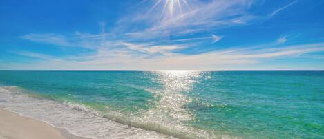 On the beach, sun-loungers