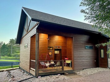 The ELOOSIVE MOOSE in-home cabin's entrance is in front of our overall cottage.