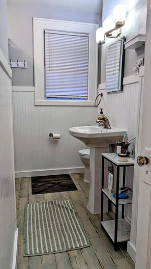 Shower, eco-friendly toiletries, hair dryer, towels