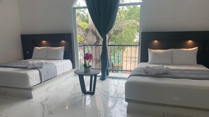 Habitación básica doble | Ropa de cama de alta calidad y edredones de plumas