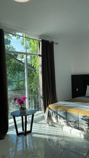 Basic Room | Premium bedding, down comforters, soundproofing, free WiFi