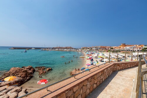 Apartment "Panoramico Isola Rossa" with Sea View, Private Terrace & A/C