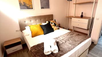 1 dormitori, planxa i posts de planxar, wifi gratuïta i roba de llit