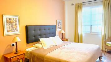 1 dormitorio, tabla de planchar con plancha, wifi gratis y ropa de cama