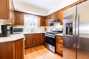 Fridge, microwave, dishwasher, coffee/tea maker - Game Days & Family Stays at Dog-Friendly Home Near Navy Stadium w Private Fenced-In Yard (Annapolis)