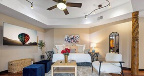TV, fireplace, books, offices - Elena's Sandia Sanctuary - An Irvie Home (Albuquerque)
