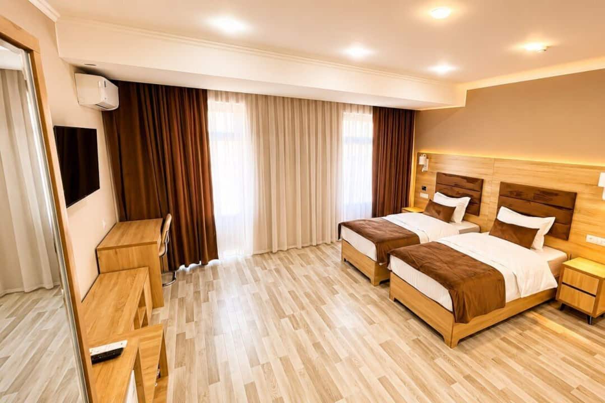 Basic Twin Room | Premium bedding, desk, laptop workspace, WiFi (free)